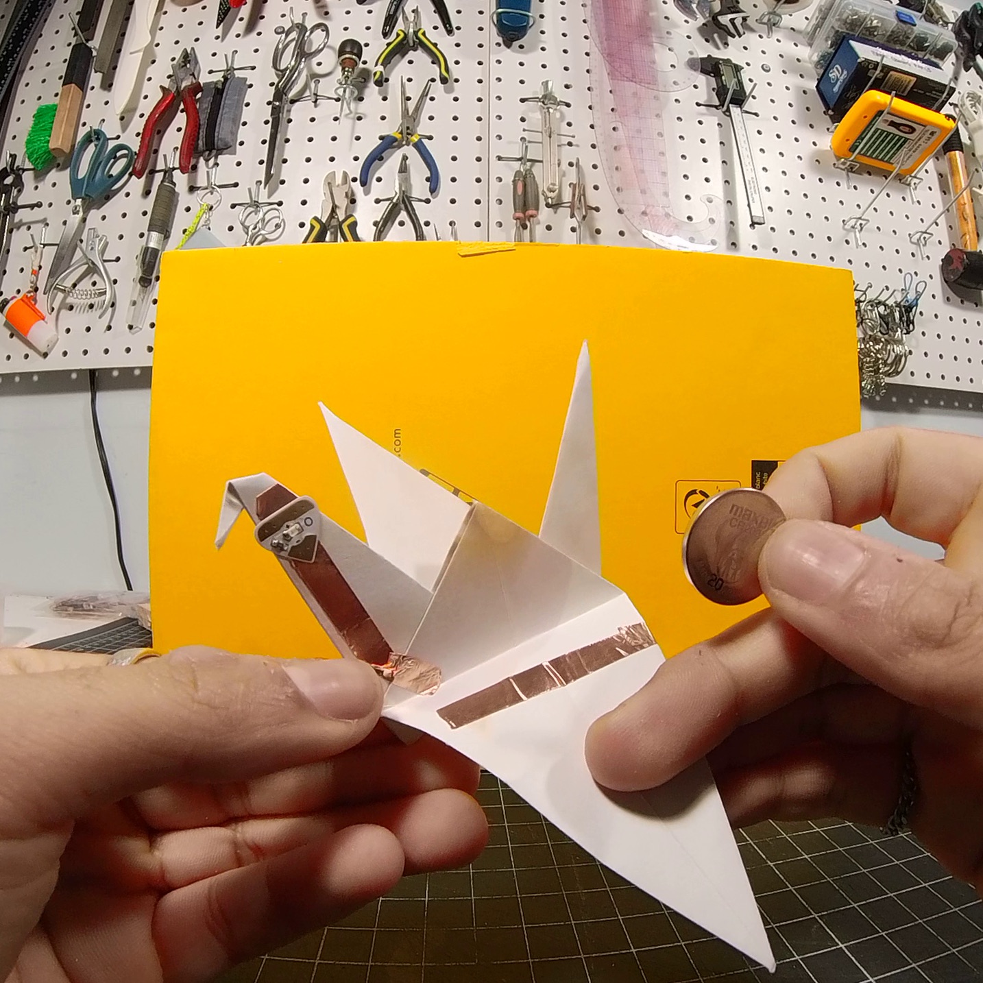 Origami bird prototype V2 - this one worked but I only used one light instead of 2 just to prove the concept <br> <a href='https://youtu.be/mECKxrWcwtw' target='_blank'>Origami Bird Circuit Video</a>